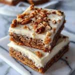 Carrot Cake Bars Recipe: Moist and Delicious Dessert These Carrot Cake Bars are a delightful twist on the classic carrot cake, offering all the flavors of the beloved dessert in an easy-to-serve bar form. With warm spices, tender carrots, and a luscious cream cheese frosting, they’re the perfect treat for any occasion—from potlucks and parties to a simple afternoon snack. Ingredients: 2 cups all-purpose flour 1 teaspoon baking powder ½ teaspoon baking soda ½ teaspoon salt 1 teaspoon ground cinnamon ½ teaspoon ground nutmeg 1 cup vegetable oil 1 cup granulated sugar 1 cup brown sugar 4 eggs 2 cups grated carrots (about 3-4 medium carrots) ½ cup chopped walnuts (optional) Cream Cheese Frosting (store-bought or homemade) Directions: Step 1: Preheat the Oven Preheat your oven to 350°F (175°C). Grease a 9x13-inch baking dish with butter or nonstick spray to prevent sticking. Step 2: Combine the Dry Ingredients In a medium bowl, whisk together the all-purpose flour, baking powder, baking soda, salt, ground cinnamon, and ground nutmeg. Set this mixture aside. Step 3: Mix the Wet Ingredients In a large mixing bowl, whisk together the vegetable oil, granulated sugar, brown sugar, and eggs until well combined and smooth. Step 4: Combine Wet and Dry Ingredients Gradually add the dry ingredient mixture to the wet ingredients, mixing gently until just combined. Be careful not to overmix, as this can make the bars dense. Step 5: Fold in Carrots and Walnuts Fold in the grated carrots and chopped walnuts (if using) until evenly distributed throughout the batter. Step 6: Bake the Bars Pour the batter into the prepared 9x13-inch baking dish, spreading it evenly with a spatula. Bake in the preheated oven for 25-30 minutes, or until a toothpick inserted into the center comes out clean. The top should be golden and set. Step 7: Cool the Bars Allow the carrot cake bars to cool completely in the baking dish before frosting. This helps the frosting spread smoothly and prevents it from melting. Step 8: Frost and Serve Once the bars have cooled, spread a generous layer of cream cheese frosting over the top. Cut the bars into squares and serve. Cream Cheese Frosting (Optional Homemade Recipe): 8 oz cream cheese, softened ½ cup unsalted butter, softened 2 cups powdered sugar 1 teaspoon vanilla extract Beat the softened cream cheese and butter together until smooth. Gradually add powdered sugar and vanilla extract, mixing until light and fluffy. Spread over the cooled bars. Serving and Storage Tips: Serving: These bars are best served chilled or at room temperature. Pair them with a cup of tea or coffee for a delightful treat. Storage: Store the bars in an airtight container in the refrigerator for up to 5 days. Let them come to room temperature before serving. Freezing: You can freeze the unfrosted carrot cake bars for up to 2 months. Wrap them tightly in plastic wrap and store in a freezer-safe bag. Thaw in the fridge overnight, then frost before serving. Helpful Notes: Grating Carrots: Use the small holes on your box grater to finely grate the carrots. This ensures that the carrot flavor is well-distributed throughout the bars and gives the cake a nice texture. Mixing the Batter: Be careful not to overmix the batter after adding the dry ingredients, as this can result in tough bars. Walnut Option: Adding chopped walnuts is optional but adds a nice crunch and nutty flavor to the bars. Tips from Well-Known Chefs: Ina Garten: "For extra flavor, lightly toast the walnuts before adding them to the batter. It brings out their natural nuttiness and complements the spiced cake beautifully." Martha Stewart: "To make your frosting extra smooth and creamy, ensure both the butter and cream cheese are fully softened before mixing." Frequently Asked Questions: Can I make these bars gluten-free? Yes, you can substitute the all-purpose flour with a 1:1 gluten-free baking flour. The texture may be slightly different, but they’ll still be delicious. Do I have to use walnuts? No, the walnuts are optional. You can leave them out or replace them with other nuts, such as pecans, or even dried fruits like raisins. Can I add more spices? Absolutely! Feel free to add more warm spices like ground ginger, cloves, or allspice to enhance the flavor of the bars. What’s the best way to frost the bars evenly? Let the bars cool completely before frosting. Using an offset spatula makes it easier to spread the cream cheese frosting evenly over the surface. Can I make these bars ahead of time? Yes, these bars can be made a day or two in advance. Store them in the refrigerator and frost them before serving for the best texture. What if I don’t have cream cheese frosting? If you don’t have cream cheese frosting, you can substitute with a simple buttercream or vanilla frosting. Alternatively, dust the top with powdered sugar for a lighter option. These Carrot Cake Bars are the perfect combination of warm spices, sweet carrots, and rich cream cheese frosting. Whether you're making them for a gathering or a simple indulgence at home, they are guaranteed to be a hit. Enjoy the delicious flavors of this timeless dessert in every bite!